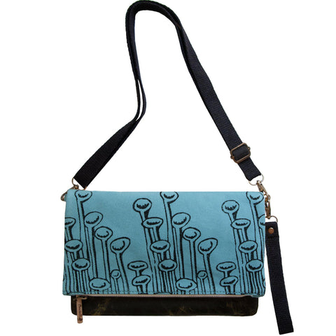 Turquoise 'Stuck to the Floor' shoulder bag that converts into a crossbody bag, or a fanny pack, or a clutch - Devrim Studio