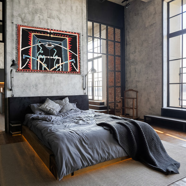 Woven tapestry, wall decor, abstract art, throw blanket by artist Leyla Pekmen-Shown inside a loft apartment. - Devrim Studio