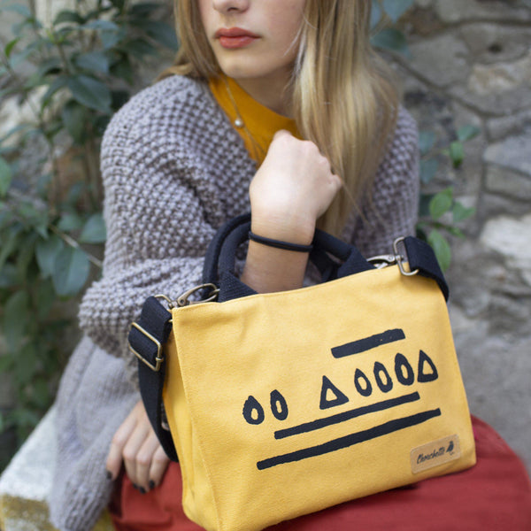 A woman holding a Yellow Hazelnut Mini Tote Bag, Shoulder Bag, Crossbody Bag-Devrim Studio