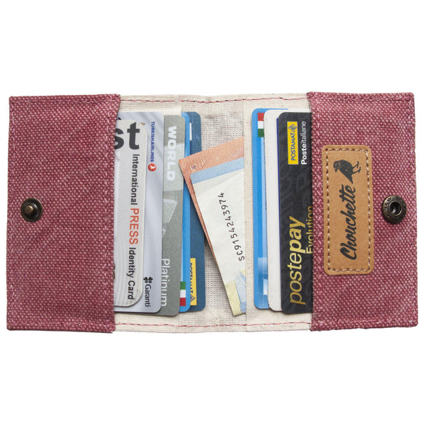 Inside of the pink cardholder, wallet with cash and cards by Devrim Studio