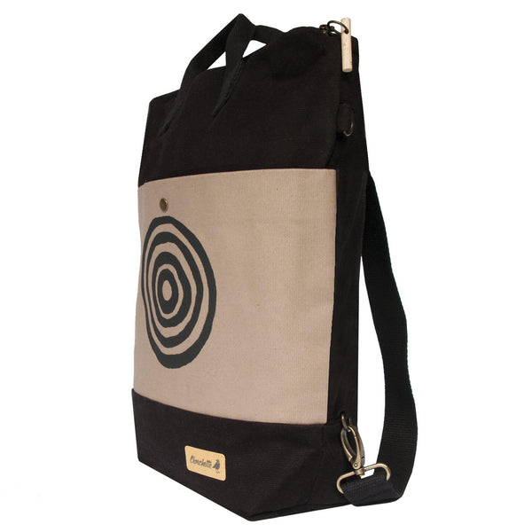 Side view of the beige and black 'Time' Convertible Backpack, Tote Bag - Devrim Studio